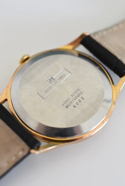 Montre BREITLING Réf. 4002, en plaqué or et acier - Cadran bicolore, Venus 227, Vers 1956.