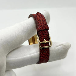 Montre HERMÈS Kelly plaqué or, acier et cuir