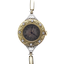 Montre en or jaune, platine et diamants