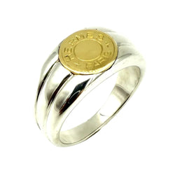 Bague Chevalière HERMÈS "Clou de selle" en or jaune et argent