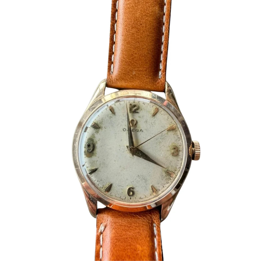 Montre OMÉGA en or jaune et cuir