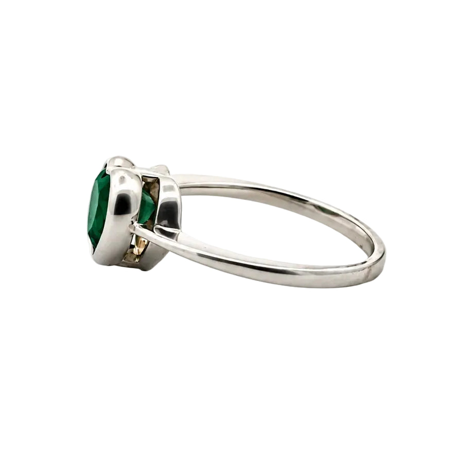 Bague Solitaire en or blanc et émeraude