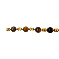 Bracelet O.J. PERRIN en or jaune et perles d'oeil de tigre