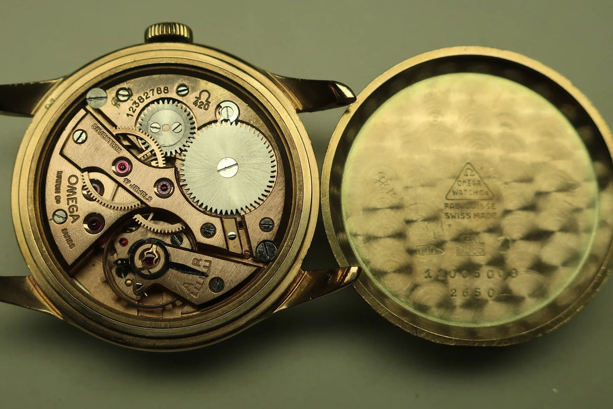 Montre OMÉGA en or jaune et cuir