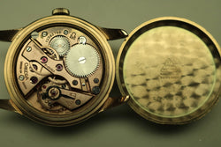 Montre OMÉGA en or jaune et cuir
