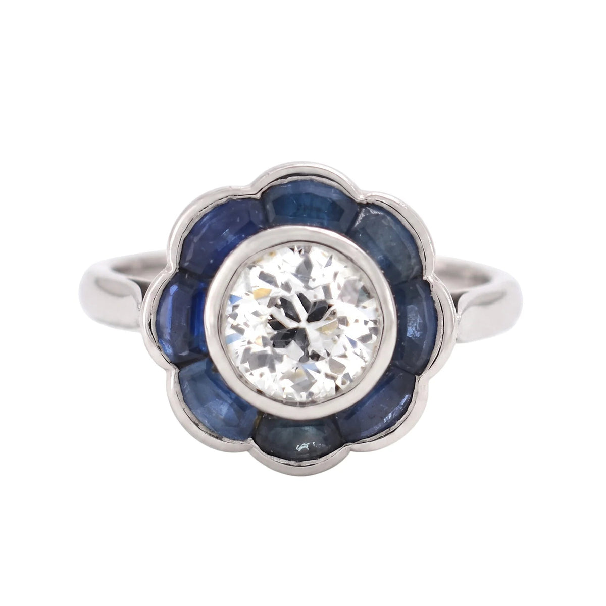 Bague Entourage en platine, saphirs et diamants