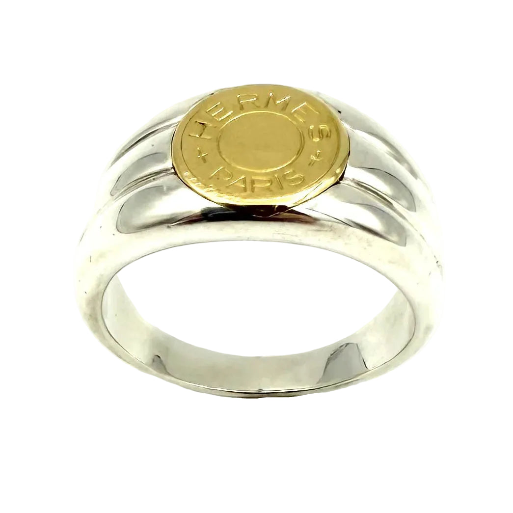 Bague Chevalière HERMÈS "Clou de selle" en or jaune et argent