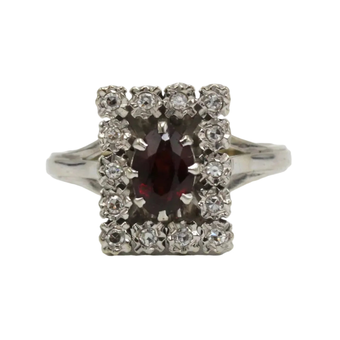 Bague Entourage en or blanc, grenat et diamants