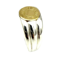 Bague Chevalière HERMÈS "Clou de selle" en or jaune et argent