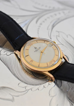Montre BREITLING Réf. 4002, en plaqué or et acier - Cadran bicolore, Venus 227, Vers 1956.