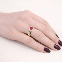 Bague Solitaire en or jaune, rubis et diamants