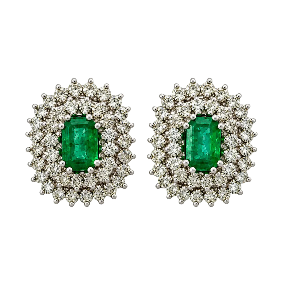 Boucles d'oreilles Clips en or blanc, émeraudes et diamants