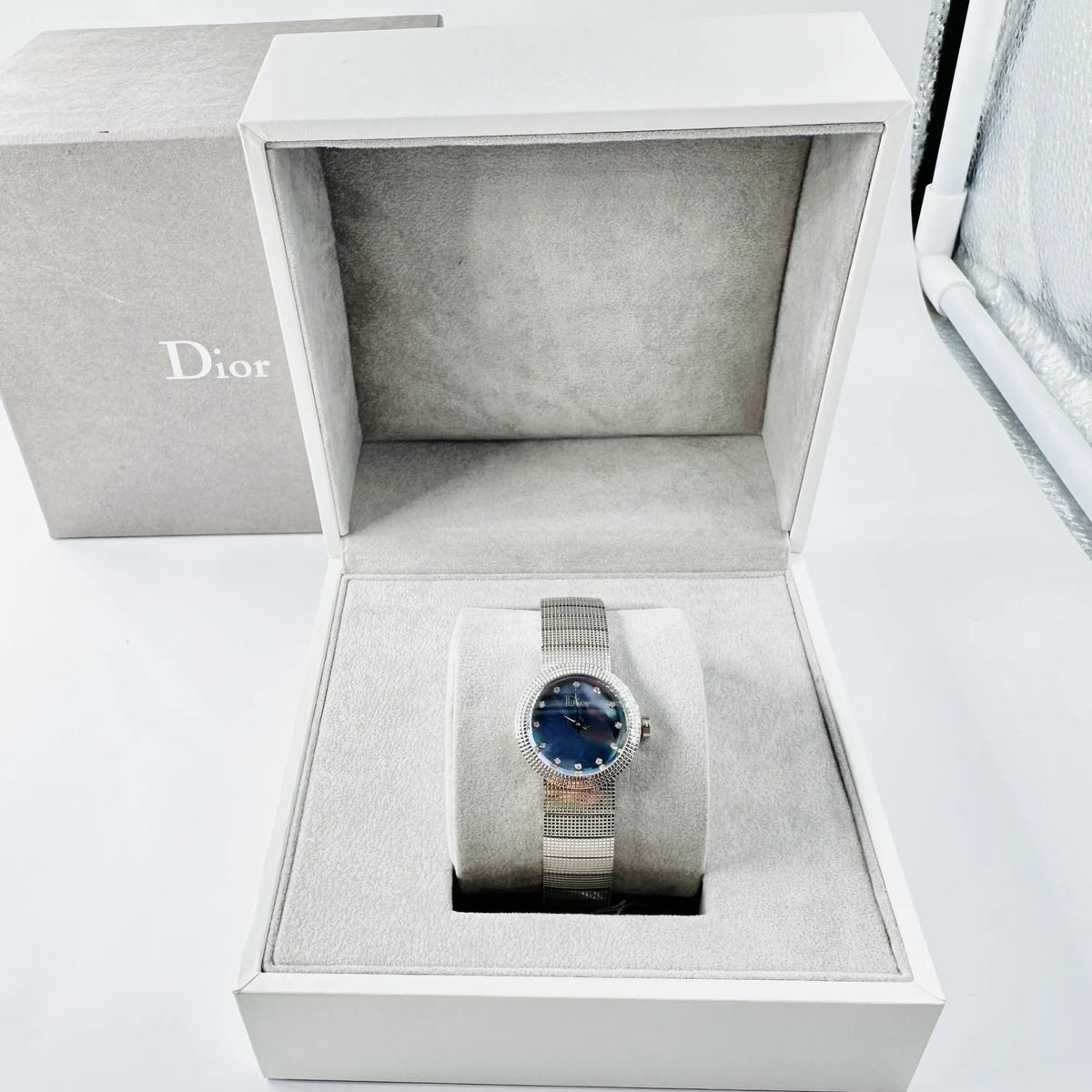 Montre de dame DIOR "La Baby D" en acier, nacre et diamants