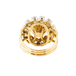 Bague Entourage en or jaune, platine, rubis et diamants