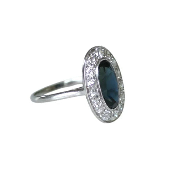 Bague Entourage en platine, saphir et diamants