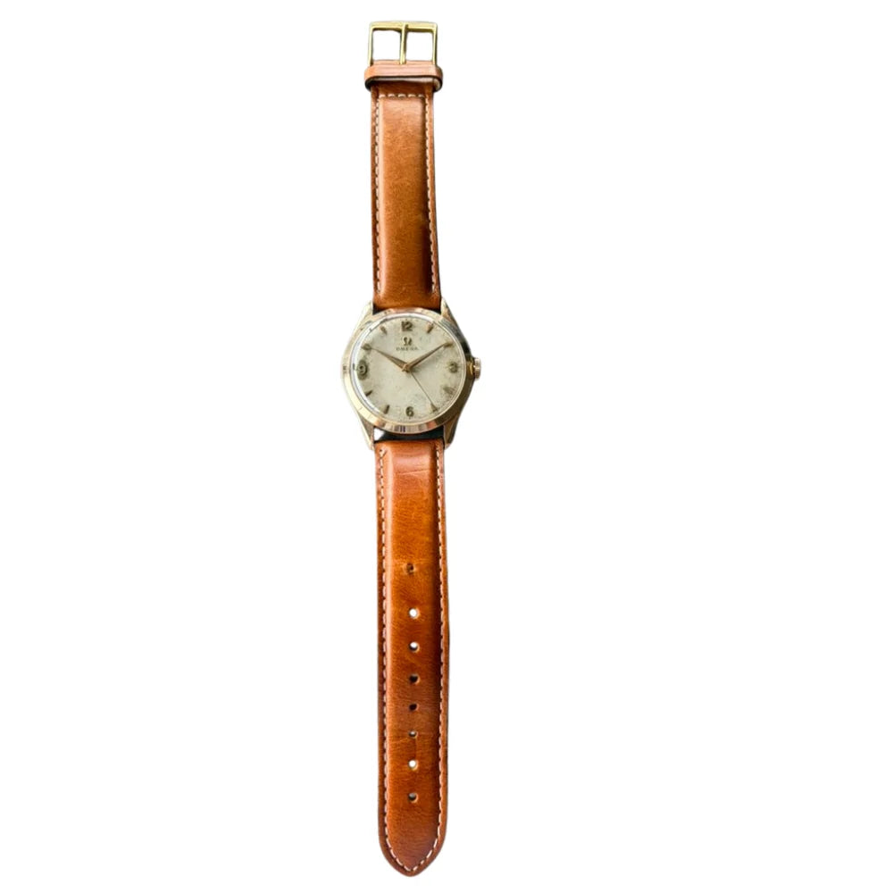 Montre OMÉGA en or jaune et cuir
