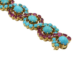 Bracelet en or jaune, rubis et turquoises