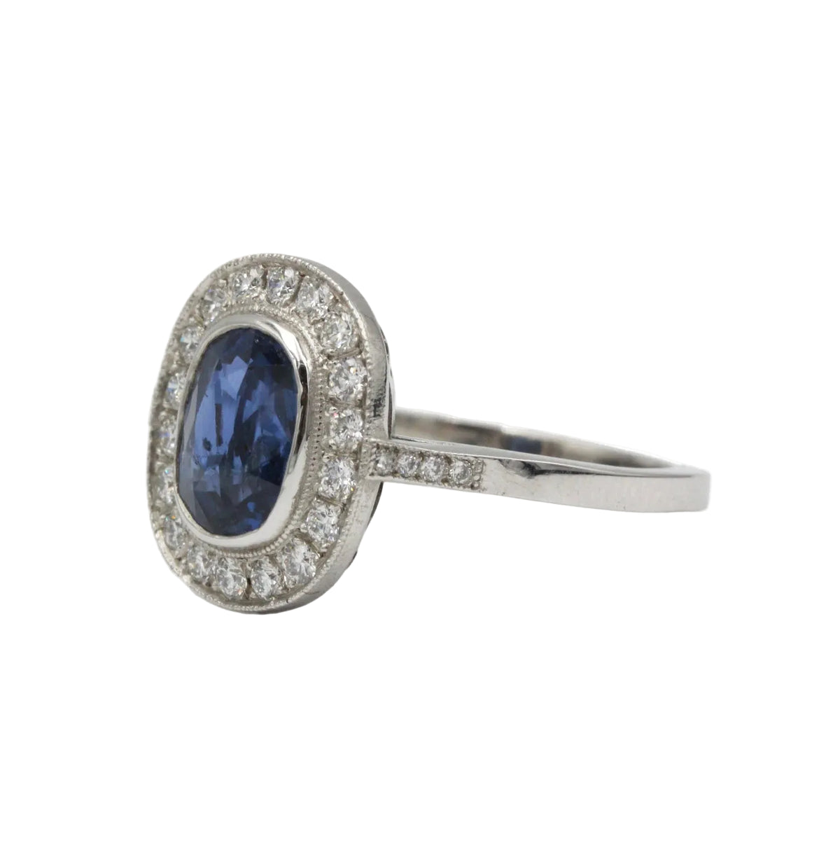 Bague Entourage en platine, saphir et diamants