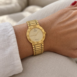 Montre CORUM "Romvlvs" en or jaune