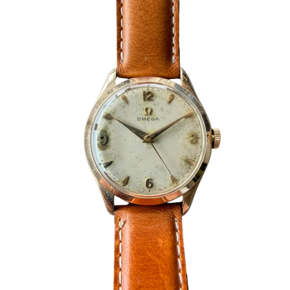 Montre OMÉGA en or jaune et cuir
