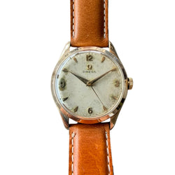 Montre OMÉGA en or jaune et cuir
