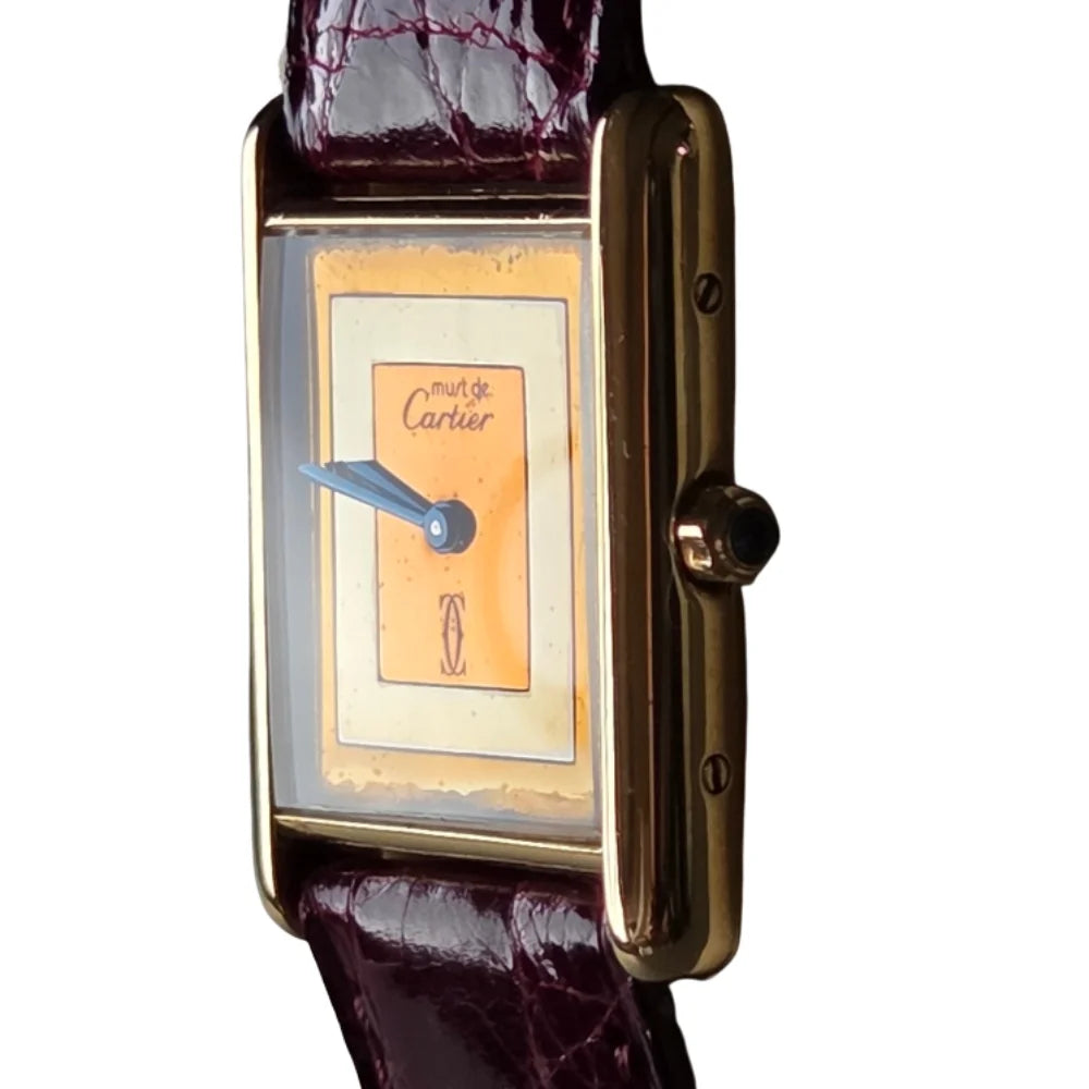 Montre CARTIER "Tank" en vermeil et cuir