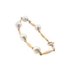 Bracelet en or jaune et perles