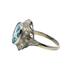 Bague Entourage en platine, aigue-marine et diamants