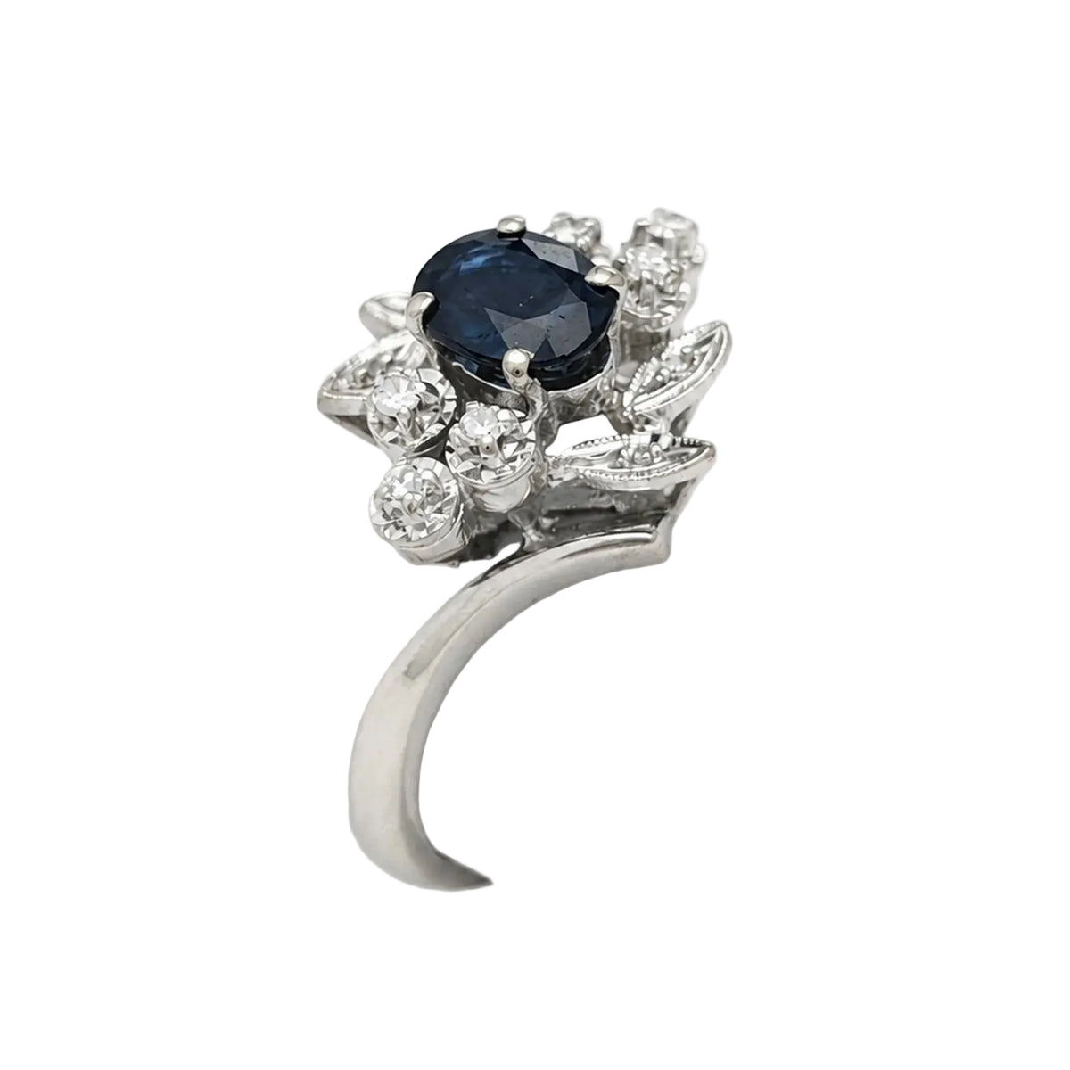 Bague Entourage en or blanc, saphir et diamants