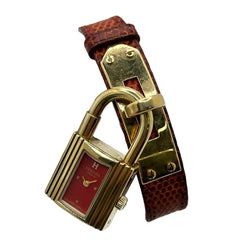 Montre HERMÈS Kelly plaqué or, acier et cuir