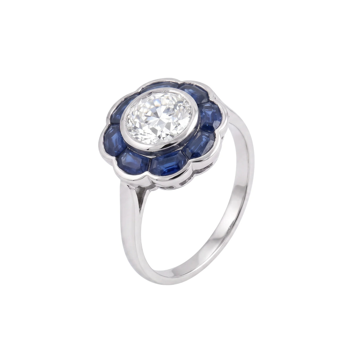 Bague Entourage en platine, saphirs et diamants