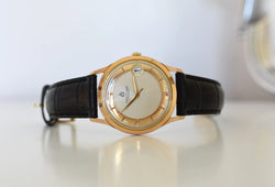 Montre BREITLING Réf. 4002, en plaqué or et acier - Cadran bicolore, Venus 227, Vers 1956.