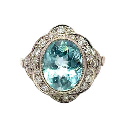 Bague Entourage en platine, aigue-marine et diamants