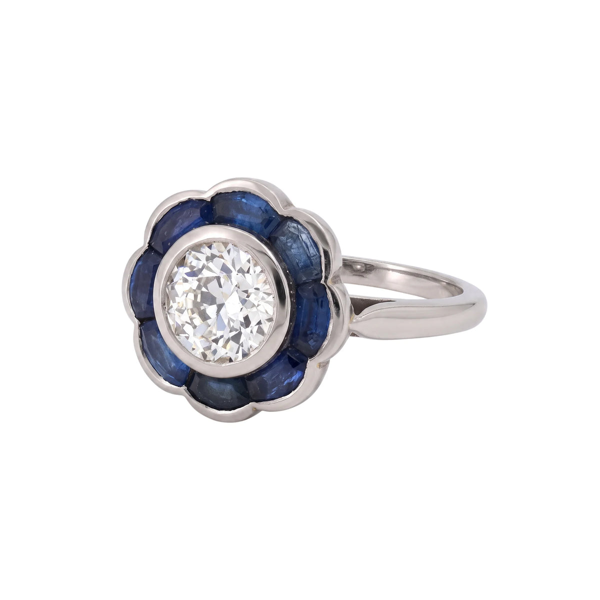Bague Entourage en platine, saphirs et diamants