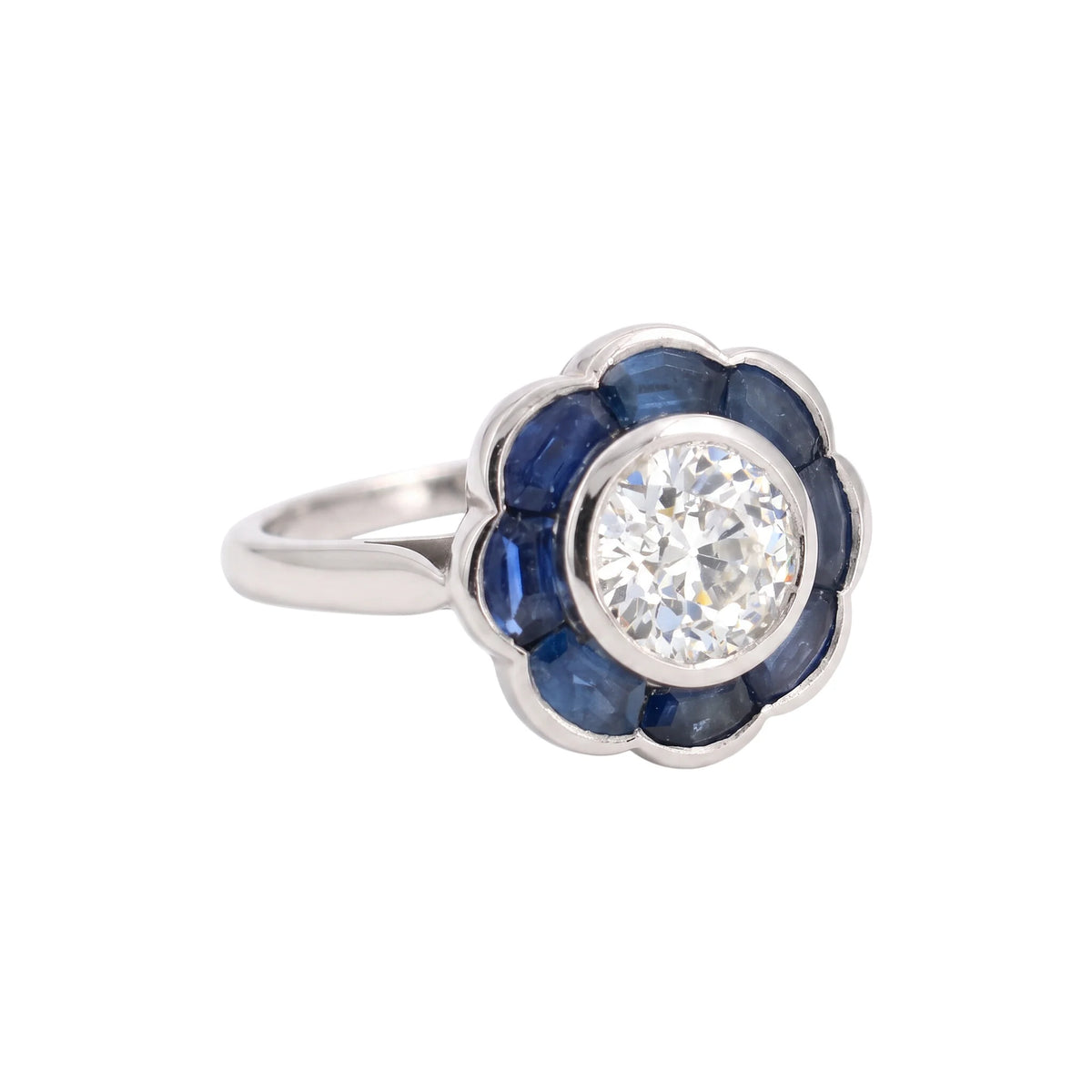 Bague Entourage en platine, saphirs et diamants