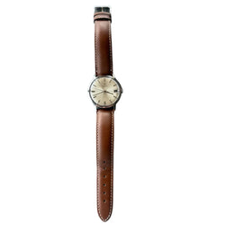 Montre UNIVERSAL GENEVE en acier et cuir