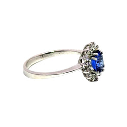 Bague Entourage en or blanc, saphir et diamants
