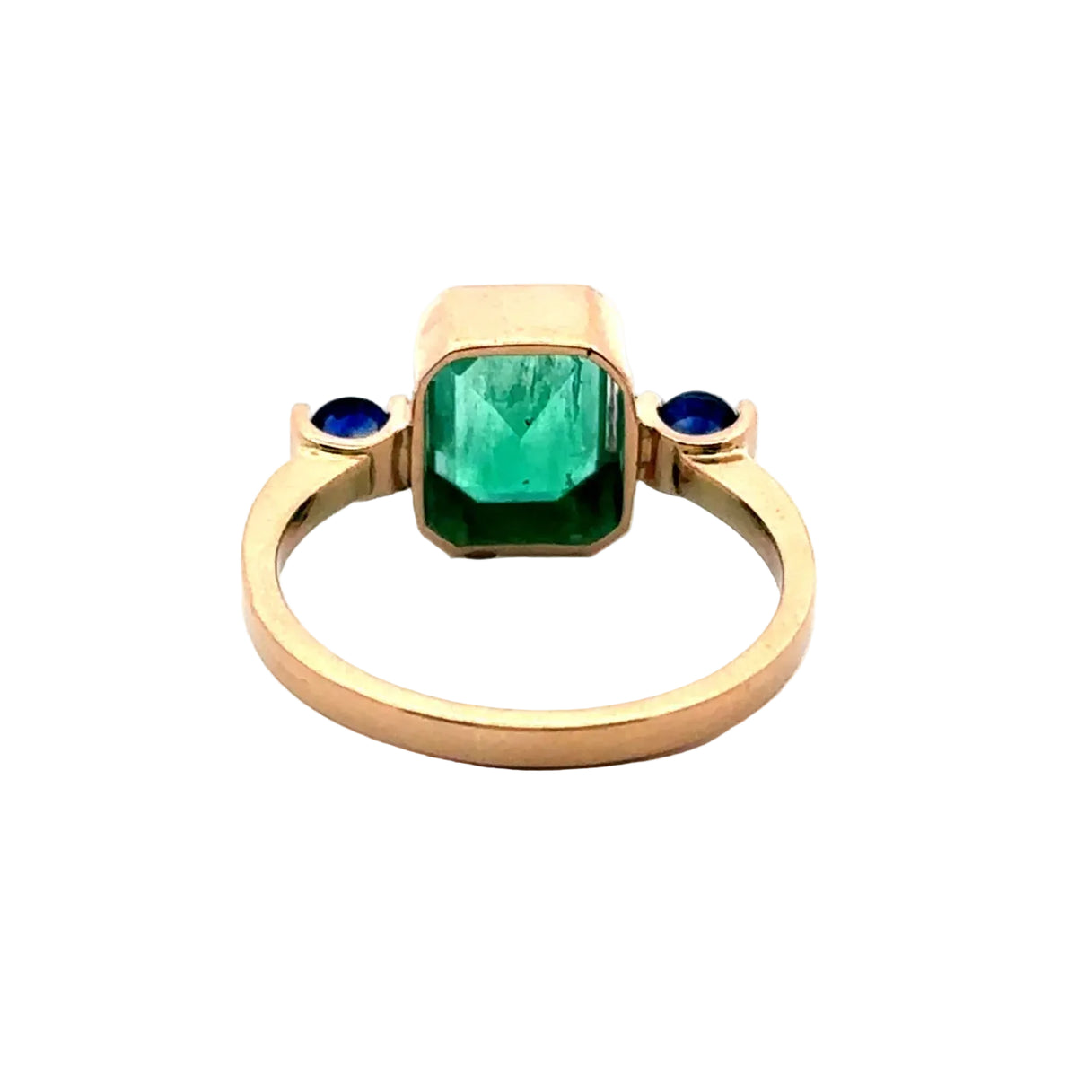 Bague Trilogie en or jaune, émeraude et saphirs