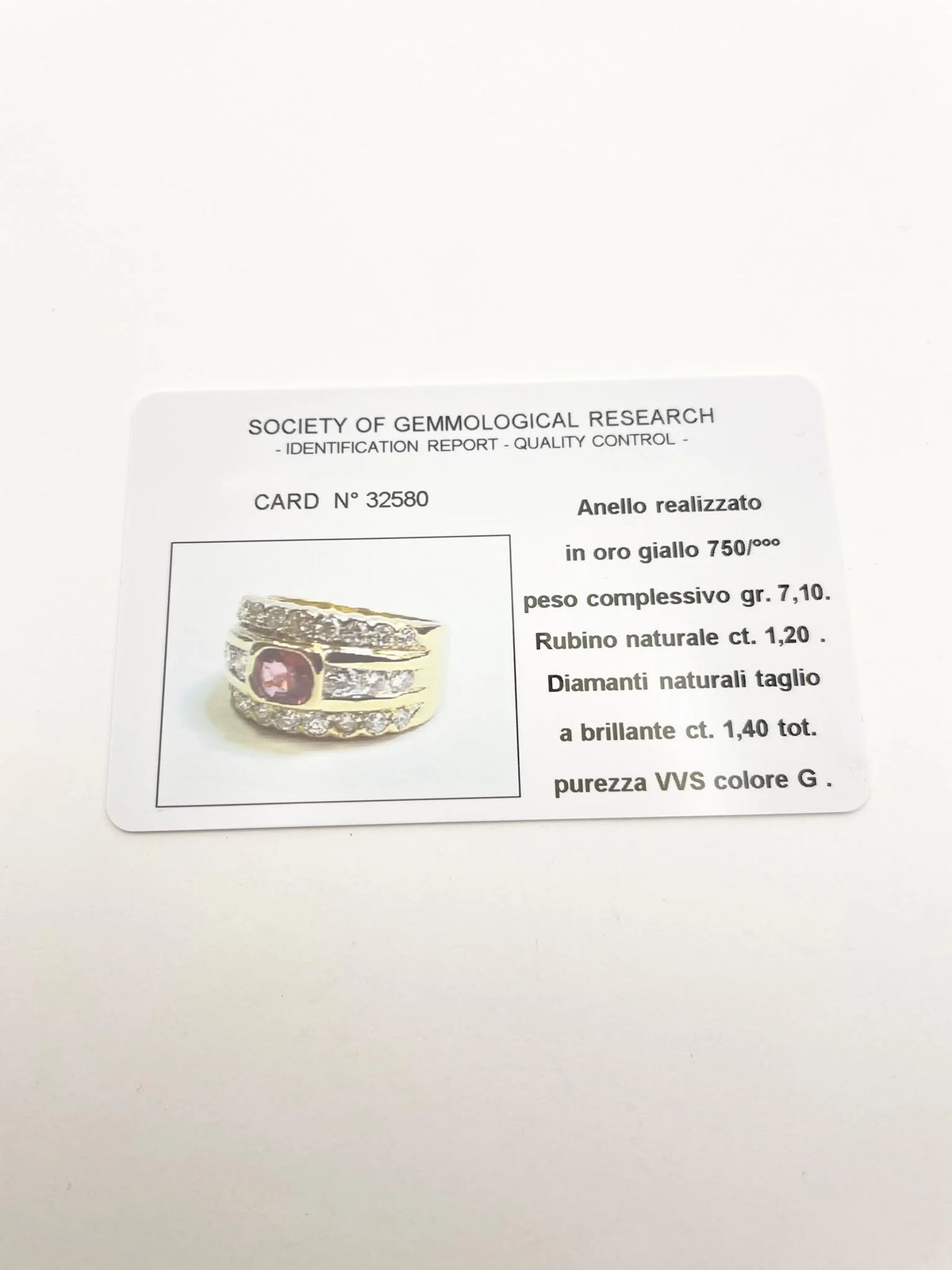 Bague Bandeau en or jaune, rubis et diamants