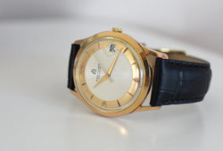 Montre BREITLING Réf. 4002, en plaqué or et acier - Cadran bicolore, Venus 227, Vers 1956.
