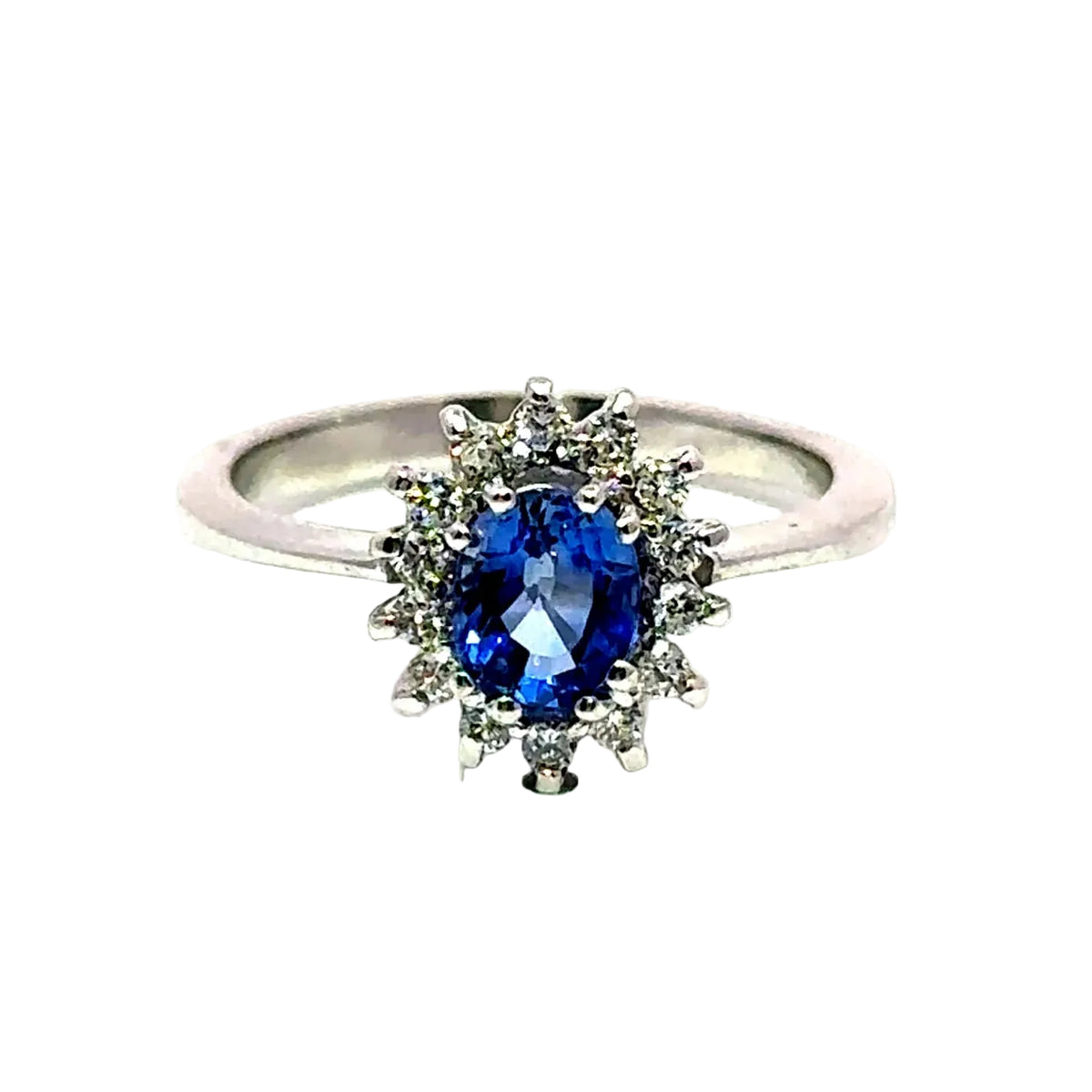 Bague Entourage en or blanc, saphir et diamants