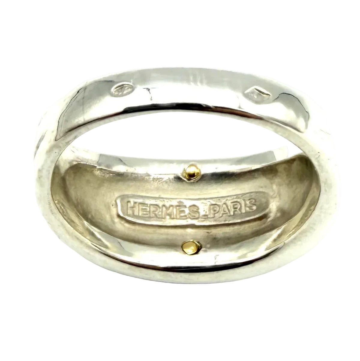 Bague Chevalière HERMÈS "Clou de selle" en or jaune et argent
