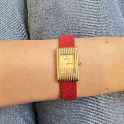 Montre BOUCHERON "Reflet" en or jaune, cuir et diamants
