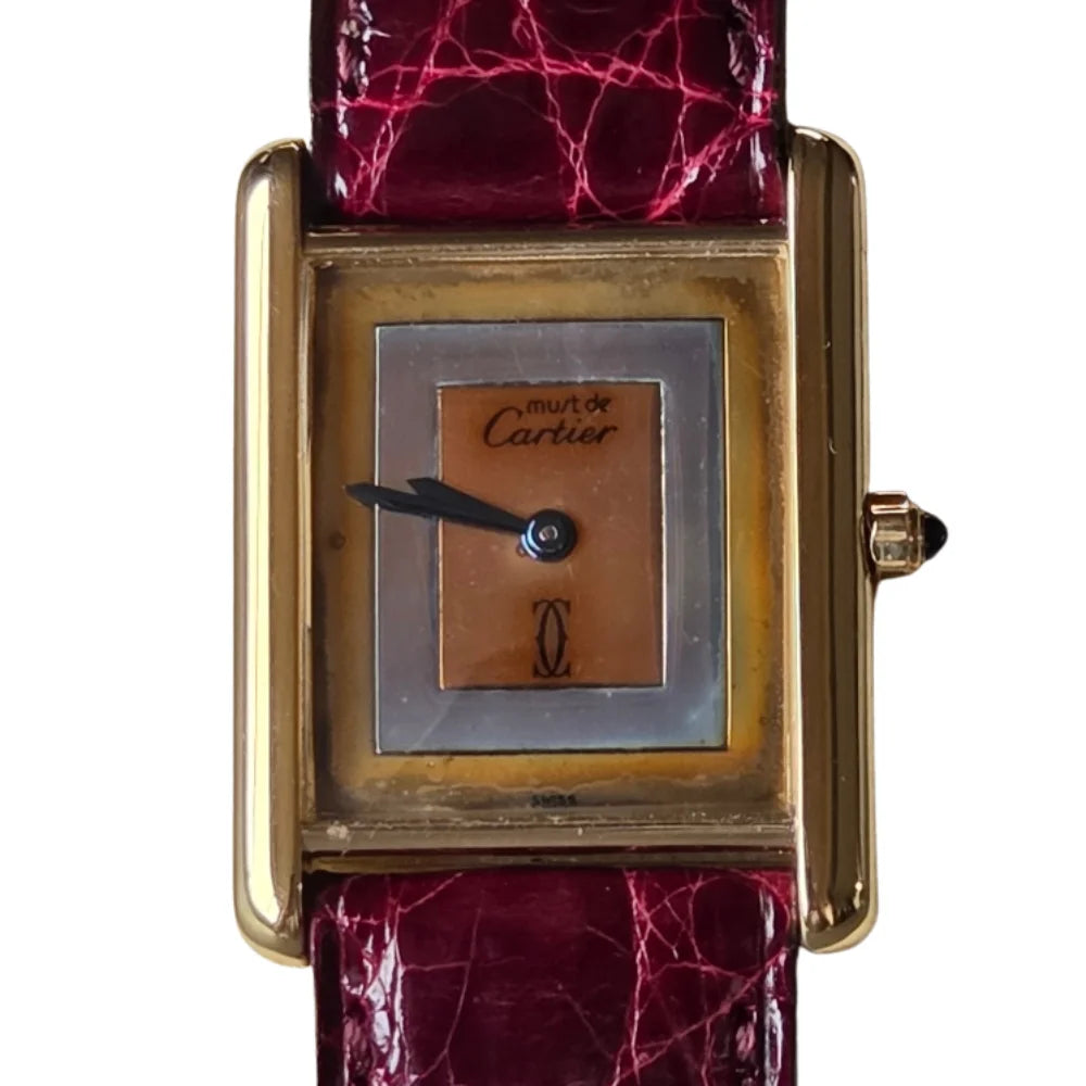Montre CARTIER "Tank" en vermeil et cuir