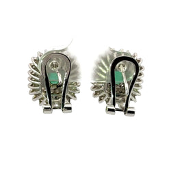 Boucles d'oreilles Clips en or blanc, émeraudes et diamants