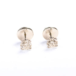 Boucles d'oreilles puces en or blanc et diamants