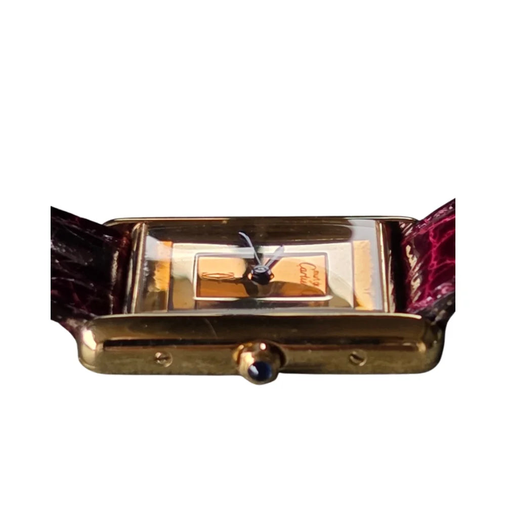 Montre CARTIER "Tank" en vermeil et cuir