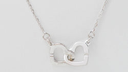 Collier double coeurs Dinh Van en or blanc