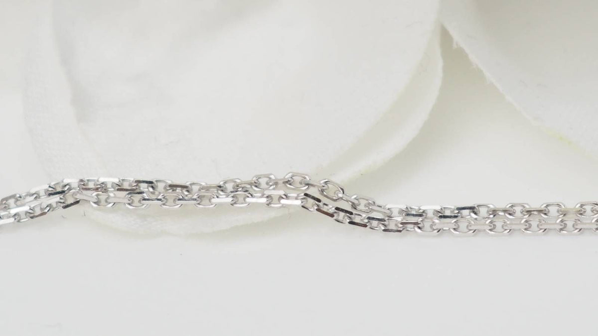 Collier pendentif en or blanc, émeraude et diamant