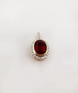 Pendentif marguerite en or deux tons tourmaline et diamants